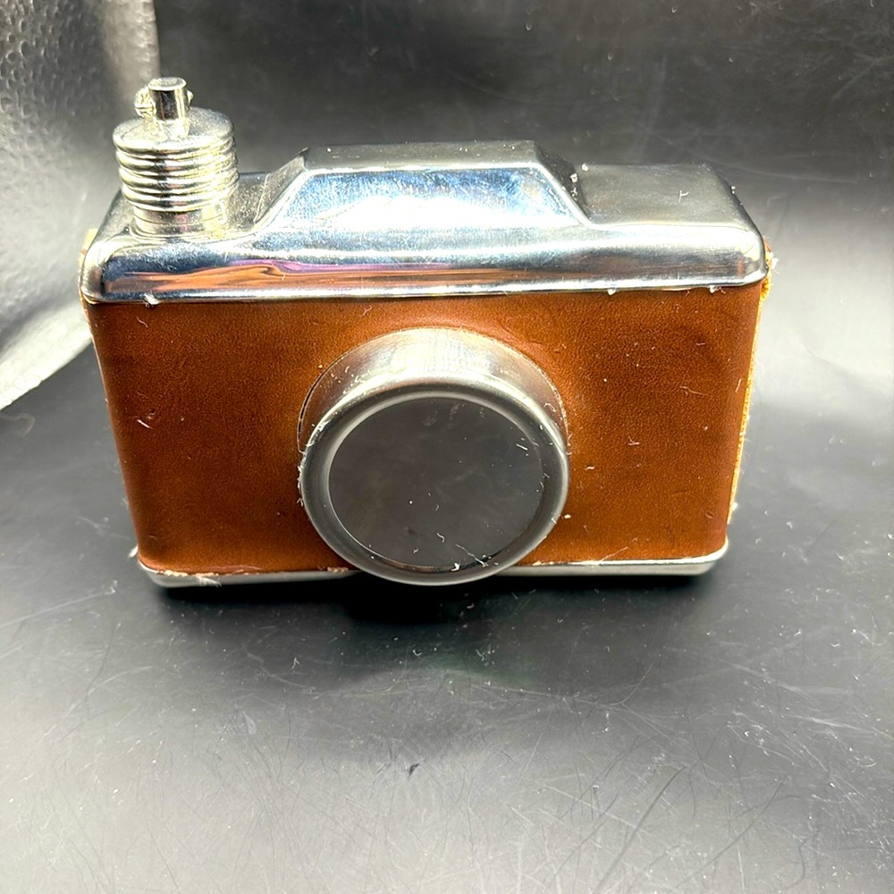 Camera shaped flask